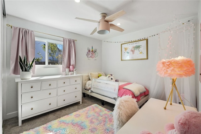 carpeted bedroom featuring ceiling fan