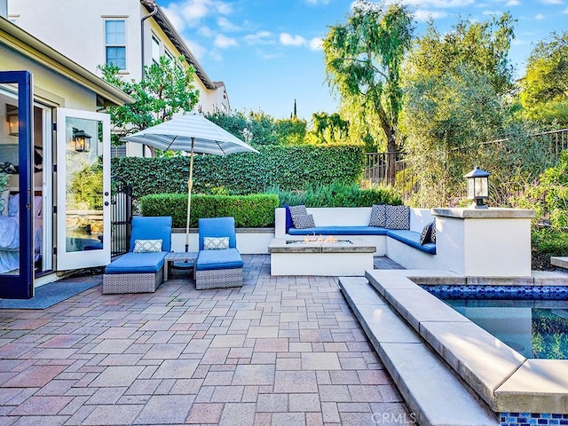 view of patio featuring fence