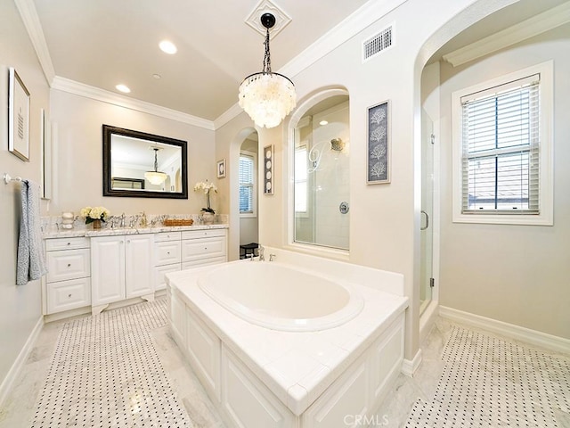 bathroom featuring visible vents, vanity, and crown molding