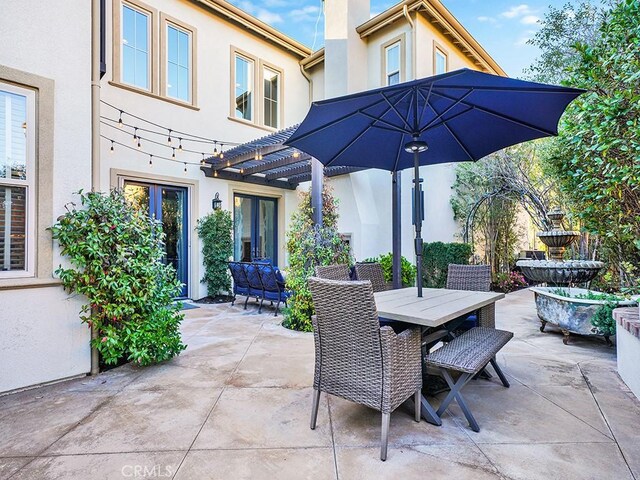 view of patio featuring outdoor dining space