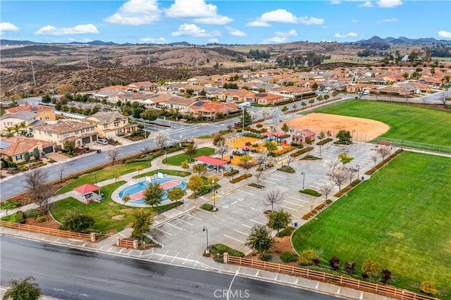 aerial view featuring a mountain view and a residential view