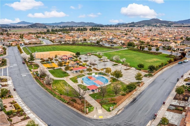 aerial view featuring a mountain view and a residential view