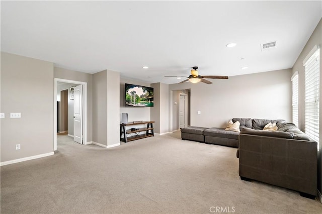 living room with baseboards, visible vents, recessed lighting, ceiling fan, and carpet flooring