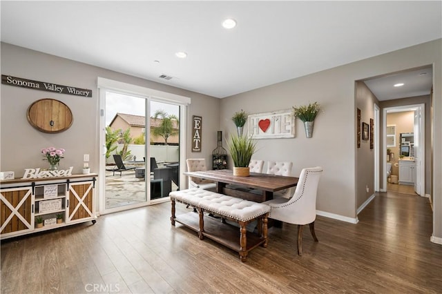 dining room with visible vents, recessed lighting, wood finished floors, and baseboards