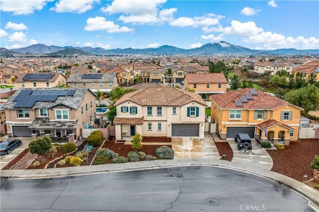 aerial view with a mountain view and a residential view