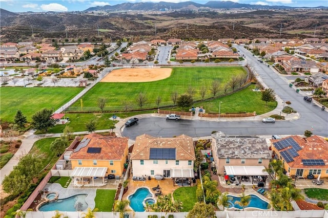 bird's eye view featuring a residential view and a mountain view