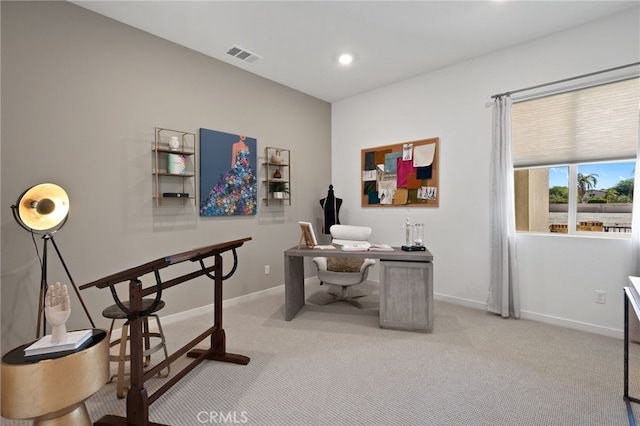 office featuring light colored carpet, recessed lighting, baseboards, and visible vents