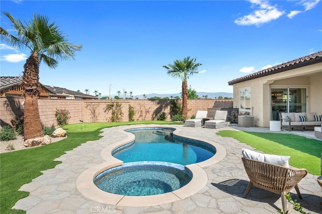 view of swimming pool featuring a fenced backyard, outdoor lounge area, and a patio