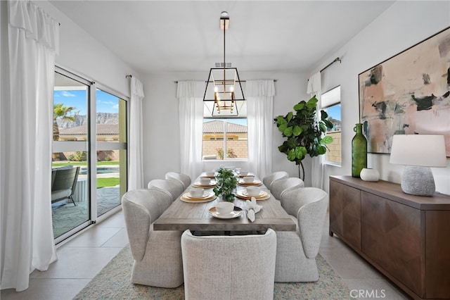 dining space with a chandelier