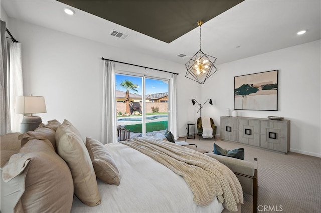 carpeted bedroom with access to exterior, recessed lighting, visible vents, and a chandelier