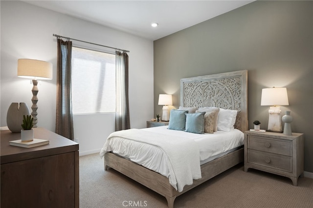 bedroom featuring recessed lighting, baseboards, and light carpet