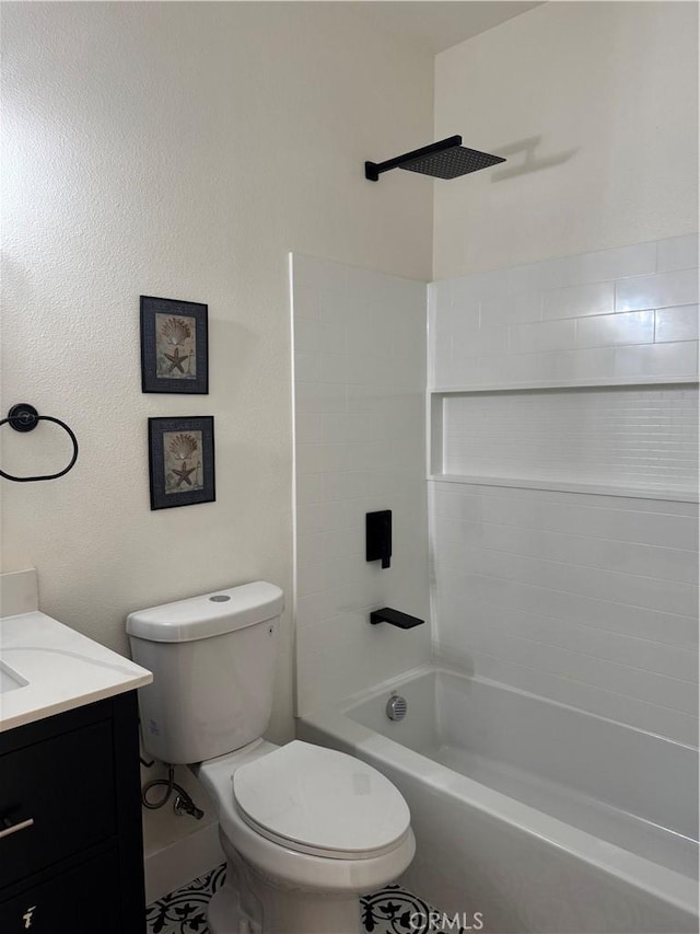 full bathroom featuring washtub / shower combination, toilet, and vanity