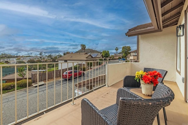 balcony featuring a residential view