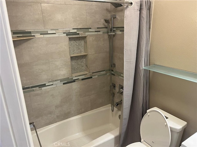 bathroom with toilet and shower / tub combo