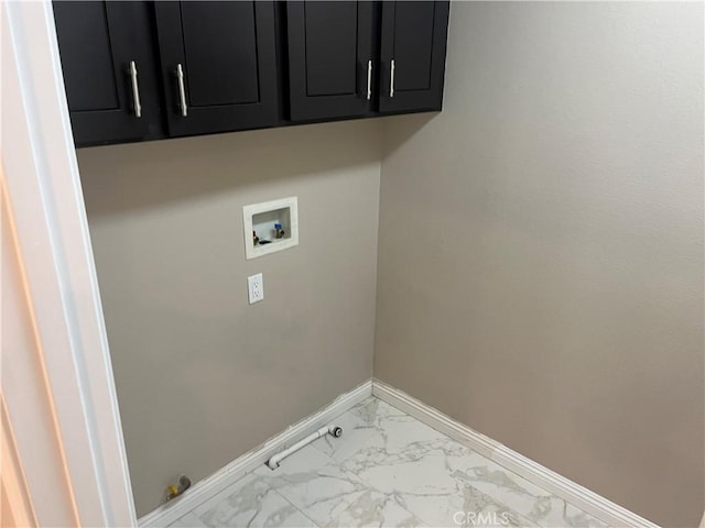 laundry area featuring marble finish floor, washer hookup, cabinet space, baseboards, and gas dryer hookup