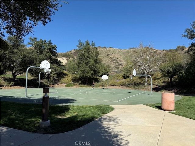 view of basketball court with community basketball court