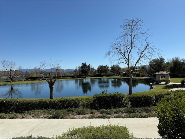 property view of water with a gazebo