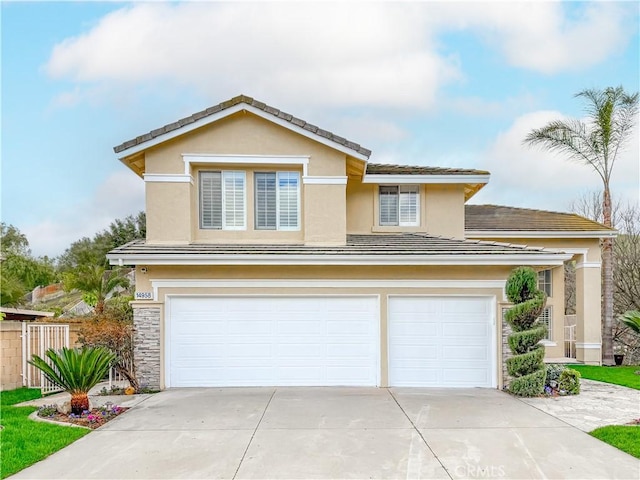 traditional-style home with fence, driveway, an attached garage, stucco siding, and stone siding