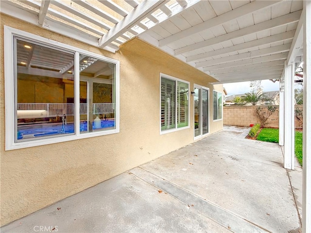 view of patio with fence