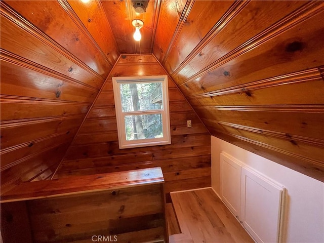 bonus room with wooden ceiling, wooden walls, vaulted ceiling, and a sauna