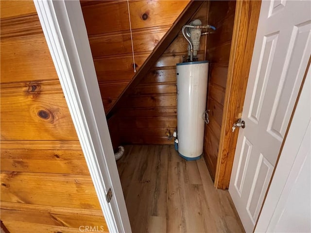 utility room featuring gas water heater