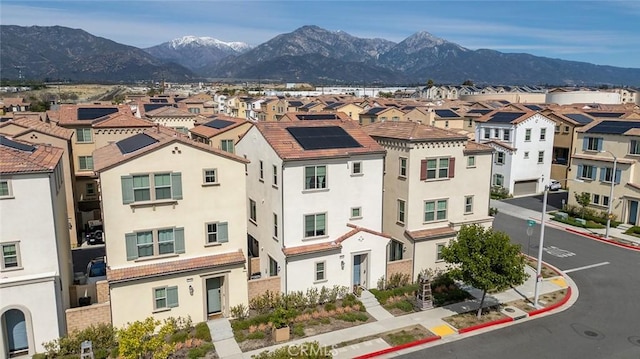 exterior space featuring a mountain view and a residential view