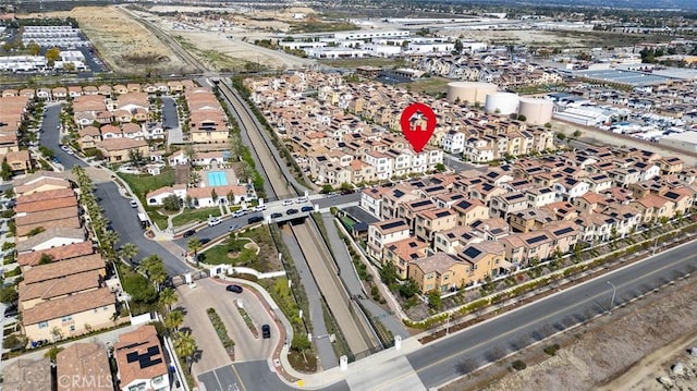 birds eye view of property with a residential view