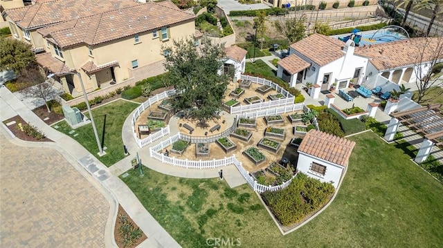 birds eye view of property with a residential view