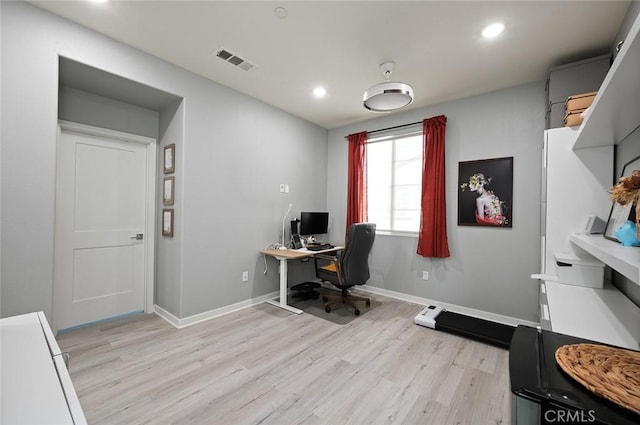 home office featuring recessed lighting, light wood-style floors, visible vents, and baseboards