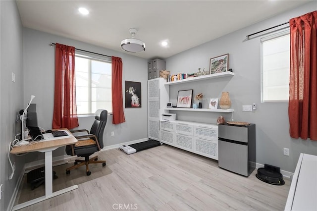 office area featuring light wood-style flooring, recessed lighting, and baseboards