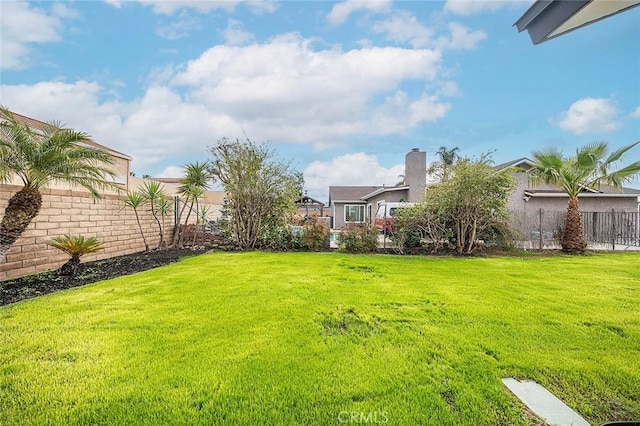 view of yard featuring fence