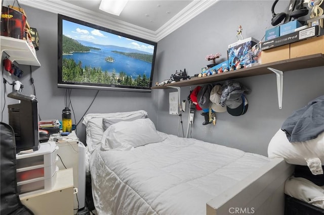 bedroom with crown molding