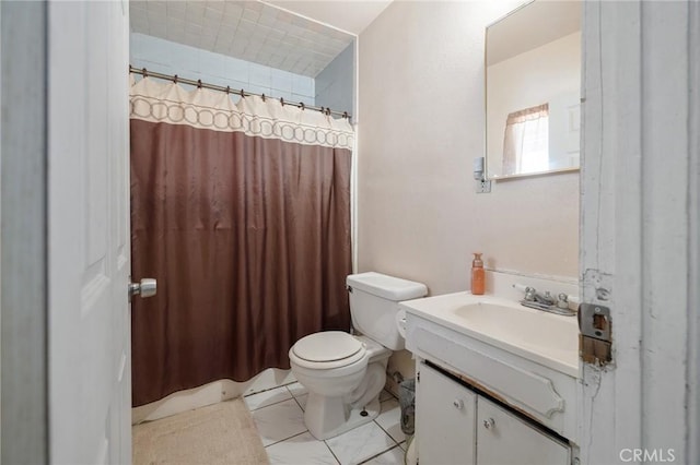 bathroom with vanity, a shower with shower curtain, and toilet