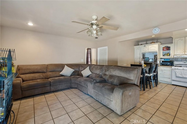 living room featuring light tile patterned floors, recessed lighting, and ceiling fan