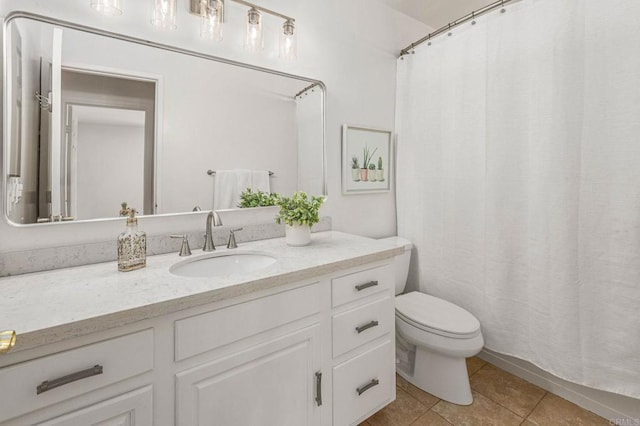 full bathroom featuring a shower with curtain, toilet, vanity, and tile patterned flooring