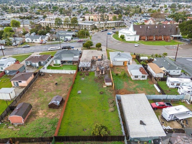 birds eye view of property with a residential view