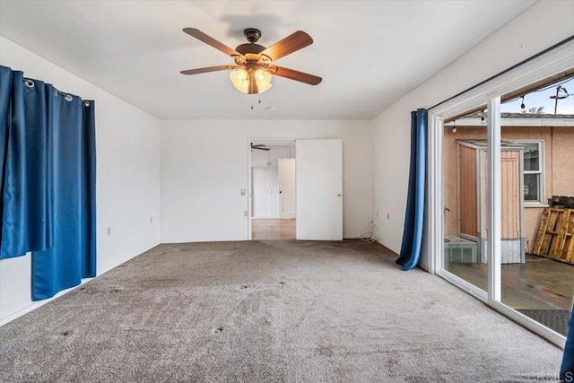 unfurnished bedroom with carpet flooring and ceiling fan