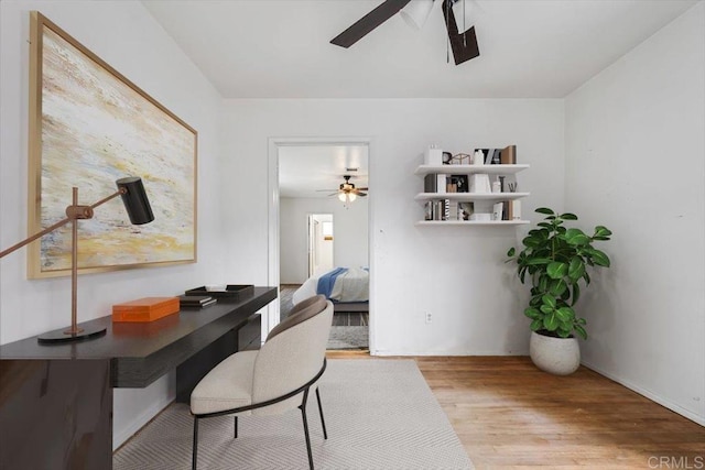 office area featuring ceiling fan and wood finished floors