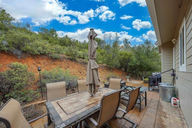 view of patio featuring outdoor dining space