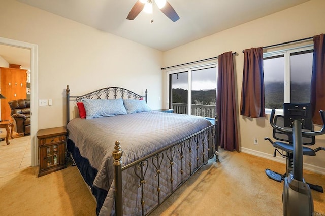 bedroom featuring baseboards, a ceiling fan, carpet, and access to outside