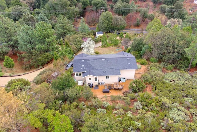 aerial view featuring a forest view