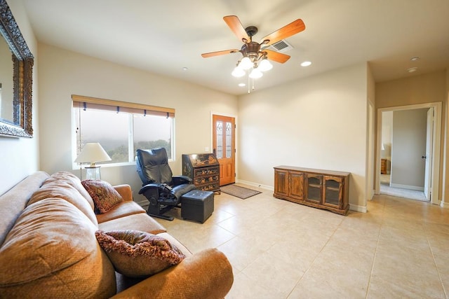 living area featuring visible vents, a ceiling fan, recessed lighting, light tile patterned flooring, and baseboards