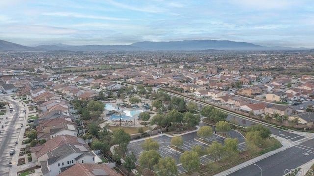 drone / aerial view featuring a mountain view and a residential view