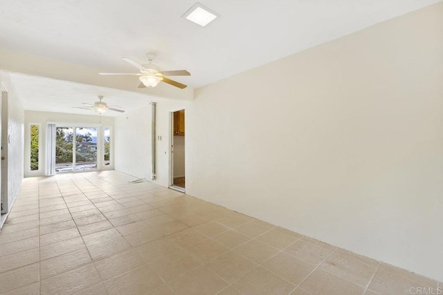 spare room with a ceiling fan