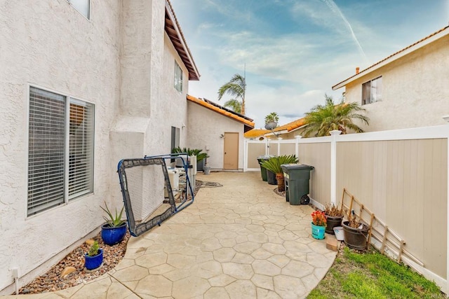 view of patio with a fenced backyard