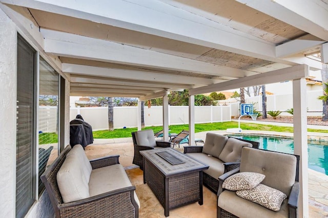 view of patio / terrace featuring an outdoor living space, a fenced backyard, and a fenced in pool