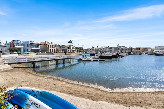 property view of water with a boat dock