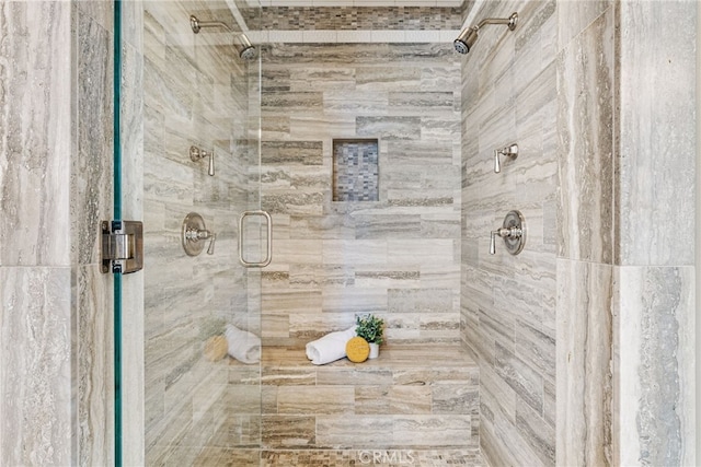 bathroom featuring a stall shower