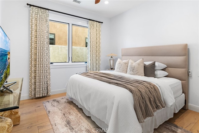 bedroom featuring visible vents, recessed lighting, baseboards, and hardwood / wood-style floors