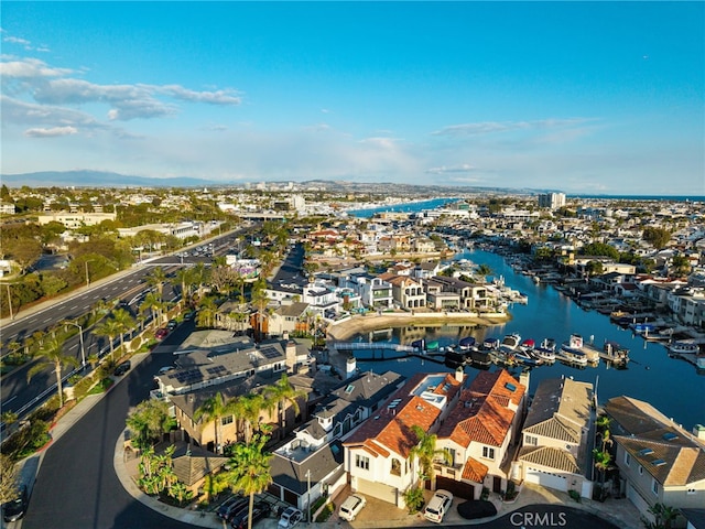 bird's eye view featuring a residential view and a water view